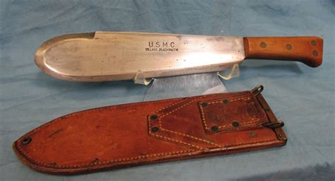 A WW 2 <b>USMC</b> <b>Bolo</b> <b>knife</b> sheath dated 44 blade has been sharpened on right side. . Usmc bolo knife history
